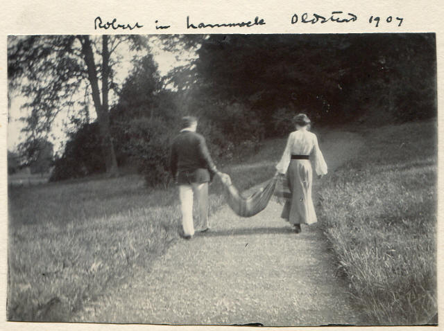 Frank & Mary Pollard carrying Robert in hammock, Oldstead, 1907