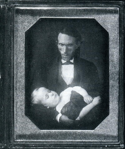 earliest-known photo of a dead human: a father holding his child